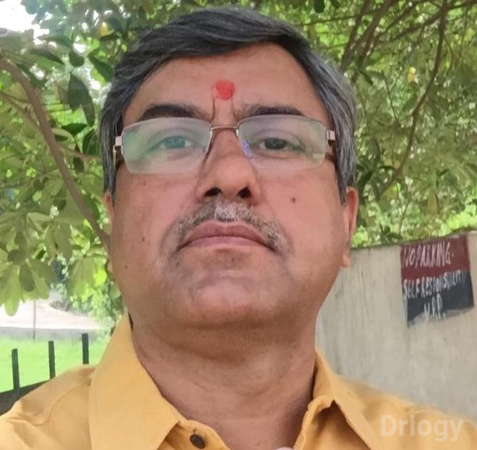 Dr. Dinesh Kapil