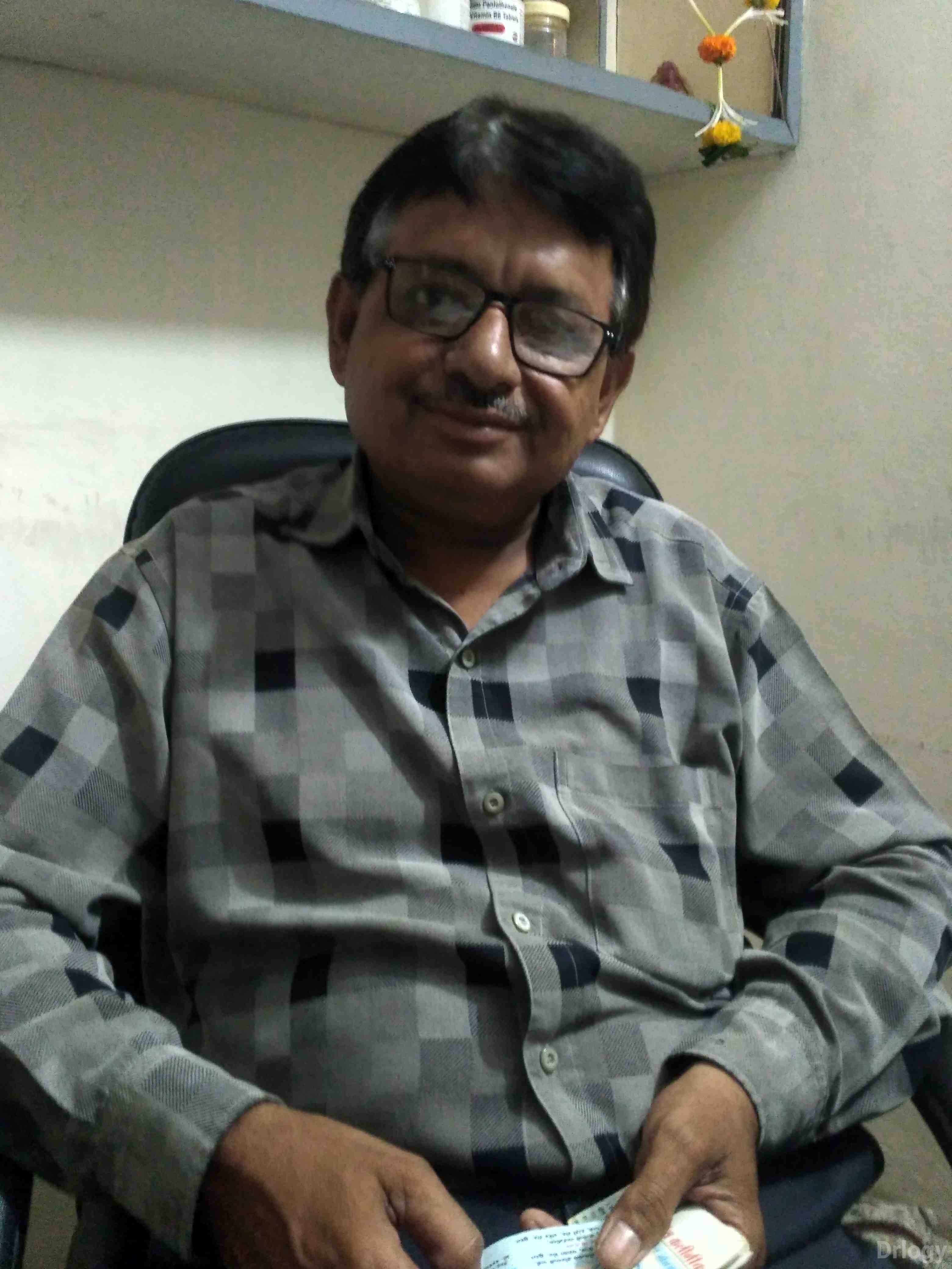 Dr. Mahesh parmar in Surat
