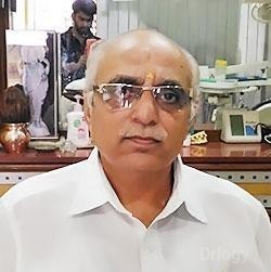 Dr. Mangesh Shah
