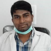Dr. Purushotham G
