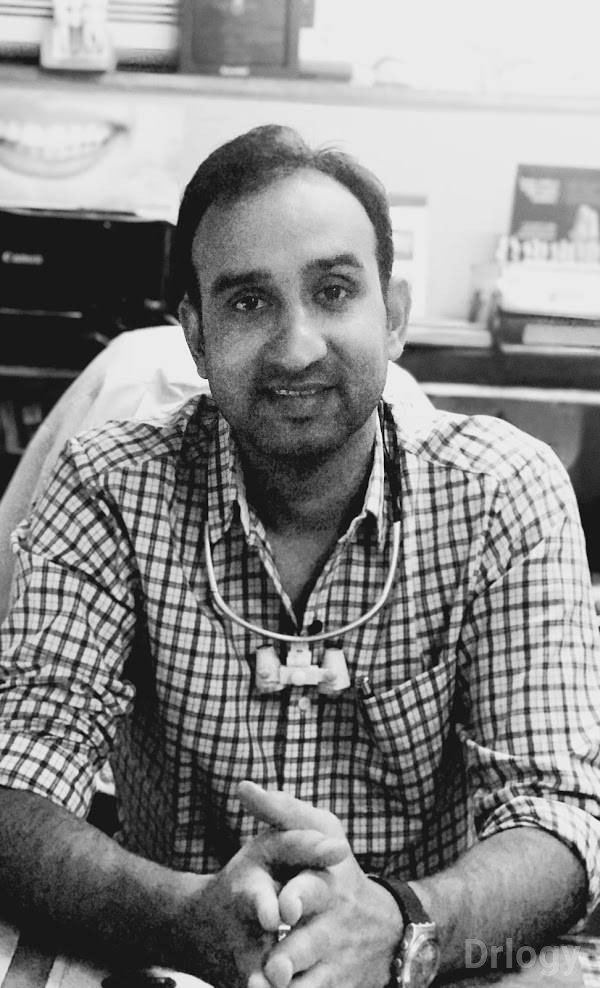 Dr. Ravindra Dhariwal