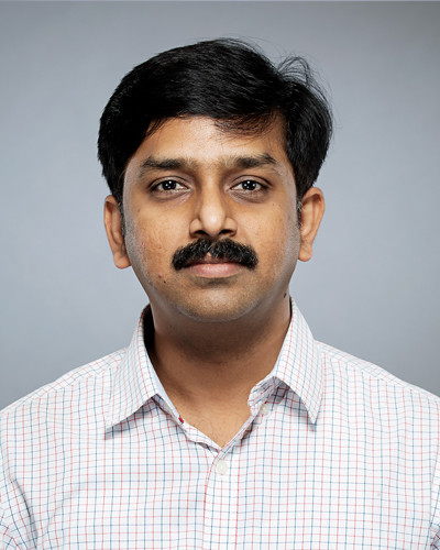 Dr. Suman S