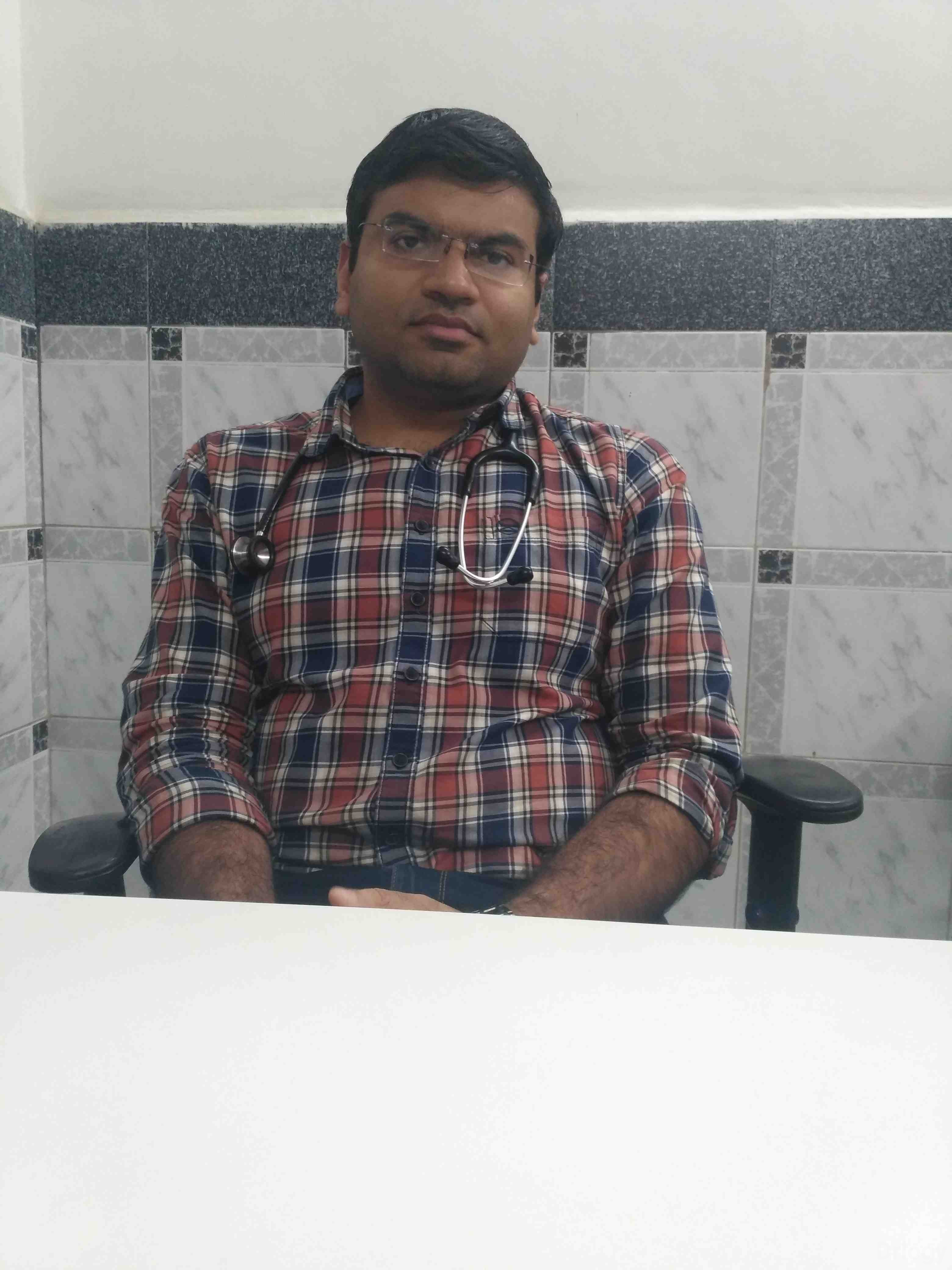 Dr. Tejas poshiya in Surat