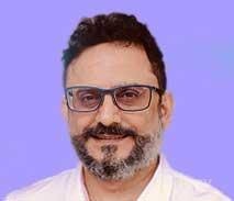 Dr. Vipin Checker