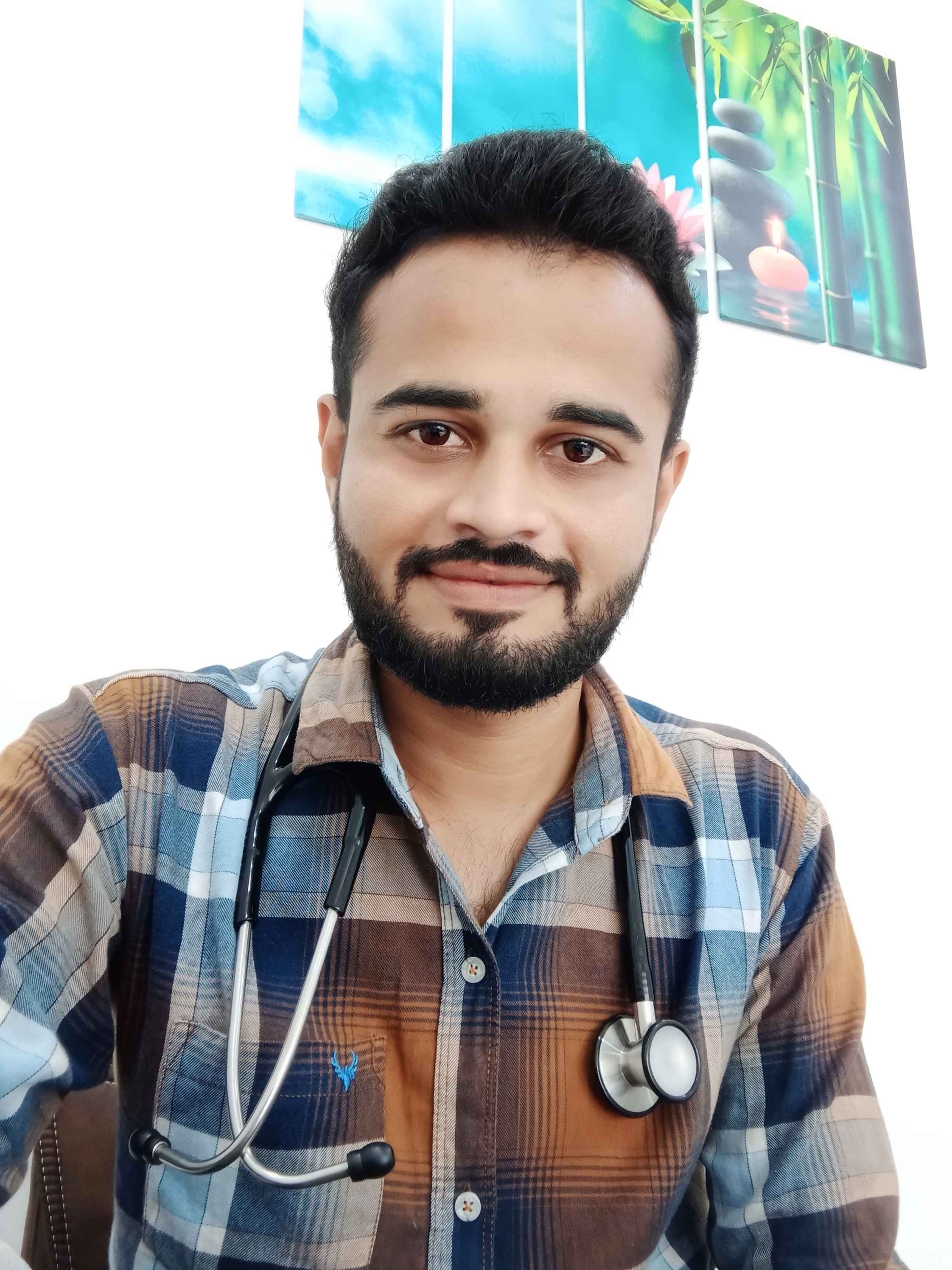 Dr. Vivek G Vasoya